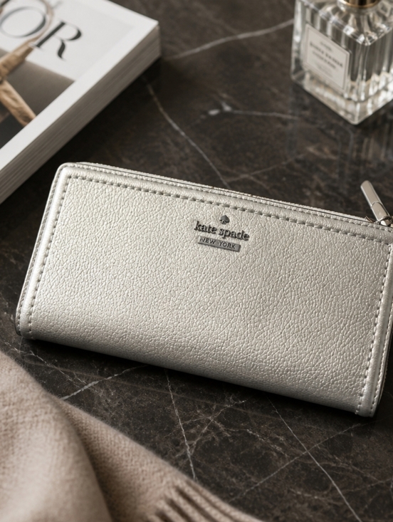 kate spade Handbags - Kate Spade Silver Snap Wallet